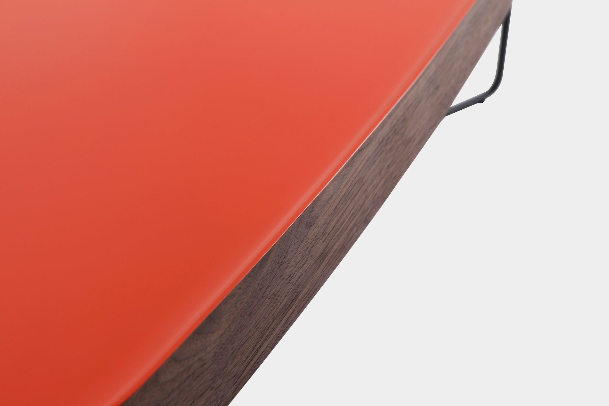 Red table with black metal legs