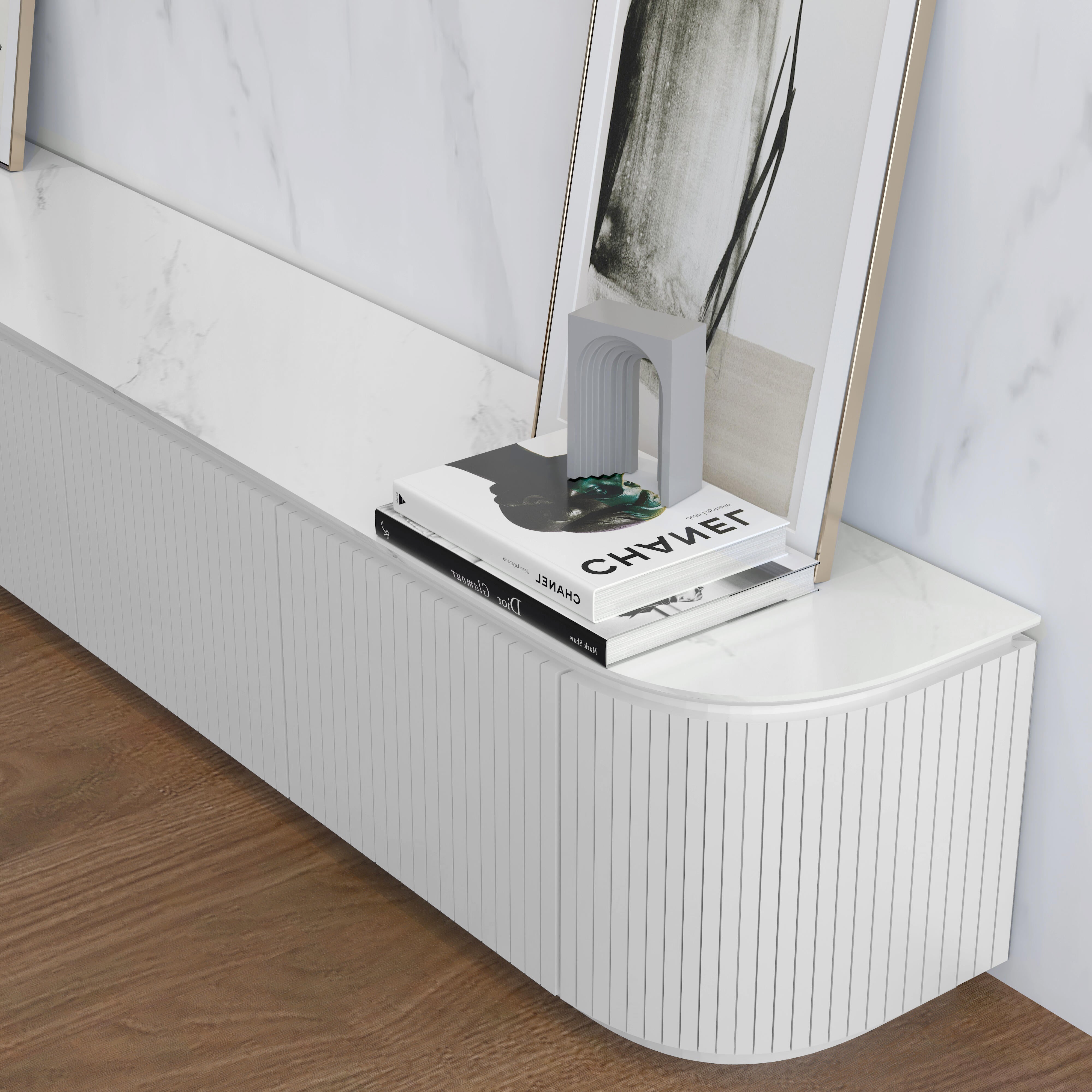 Charles TV Unit in matte white with a white sintered stone top, curved edges and slatted door detailing